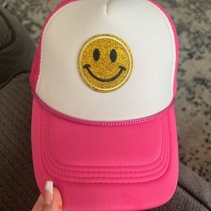 pink and white Smiley face trucker snapback hat